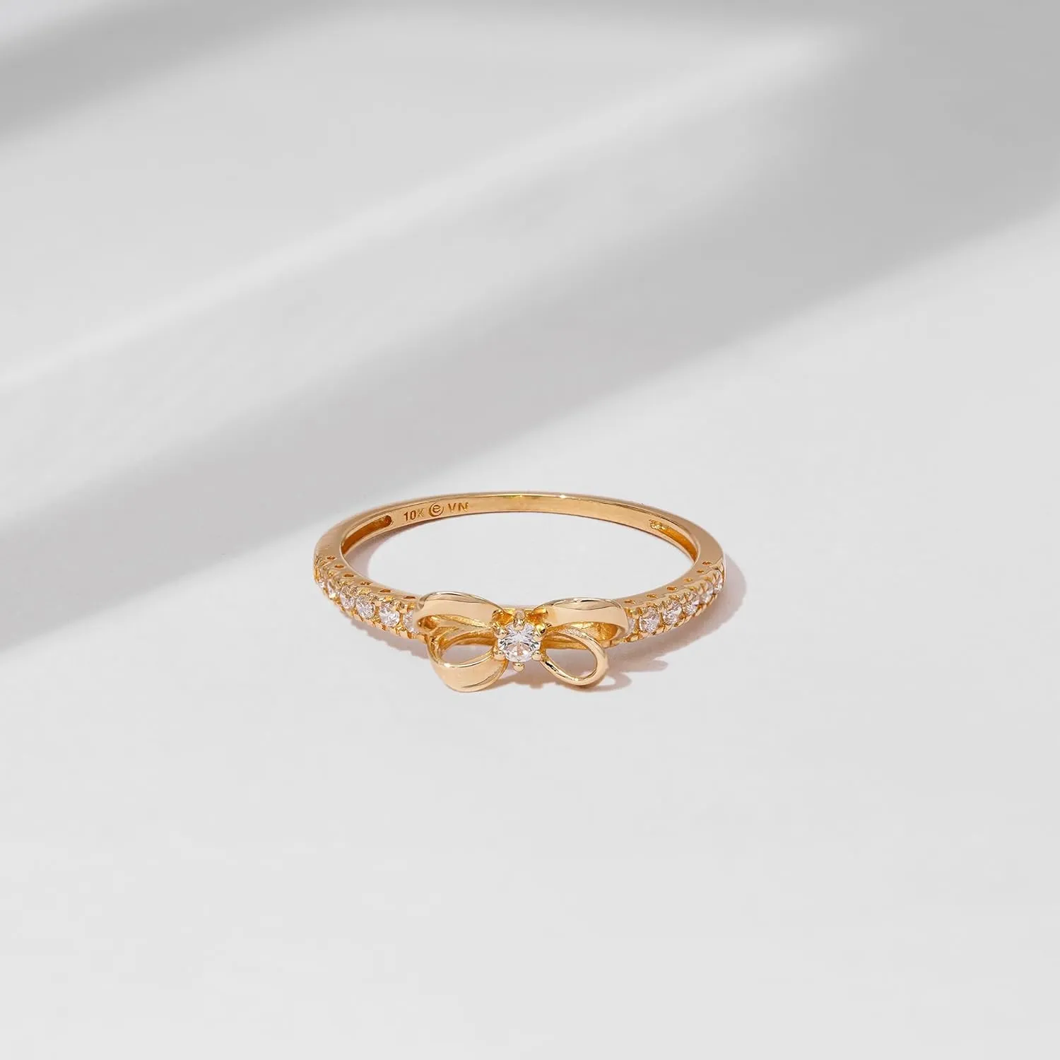 Amazon Essentials 10K Gold Dainty Bow Ring set with Round Cut Infinite Elements Zirconia (previously Amazon Collection)