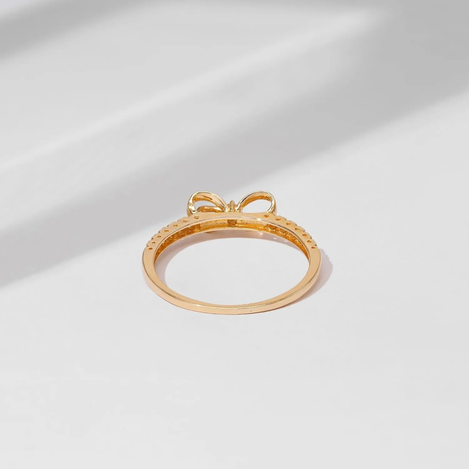 Amazon Essentials 10K Gold Dainty Bow Ring set with Round Cut Infinite Elements Zirconia (previously Amazon Collection)